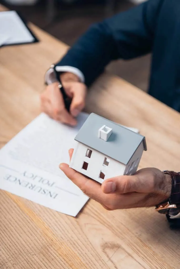 Signing final paperwork for a home purchase